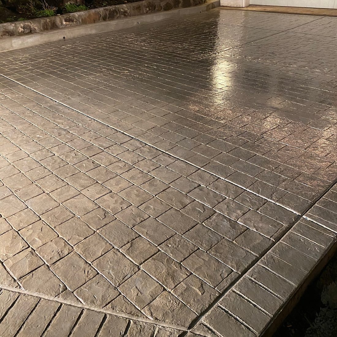 Decorative stamped concrete driveway, completed project by Rocky Ridge Concrete